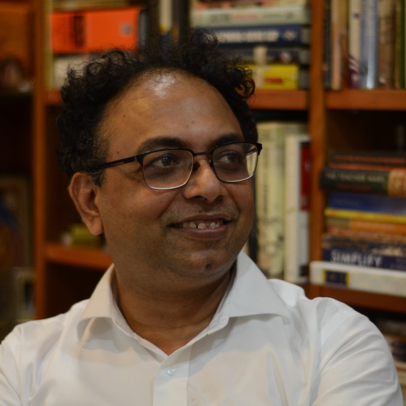 Srinivas Venkatram at his bookshelf